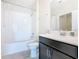 Well-maintained bathroom with shower-tub combo and updated vanity at 2820 Attwater Loop, Winter Haven, FL 33884