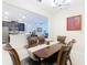 Formal dining room with a view into the open concept kitchen and living room at 2820 Attwater Loop, Winter Haven, FL 33884