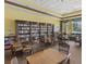 A well stocked library with many volumes and plenty of tables to sit and read or visit at 2820 Attwater Loop, Winter Haven, FL 33884