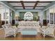 Inviting lobby featuring a comfortable seating area with wicker chairs and elegant decor at 2820 Attwater Loop, Winter Haven, FL 33884