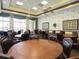 A meeting room with several large round tables with chairs at 2820 Attwater Loop, Winter Haven, FL 33884
