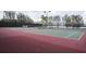 Well-maintained tennis courts with lush green surroundings for recreation and healthy living within the community at 2820 Attwater Loop, Winter Haven, FL 33884