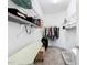 Walk-in closet with metal shelving for storing personal items at 2820 Attwater Loop, Winter Haven, FL 33884