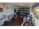 Enclosed back porch with storage, a small table, and household equipment at 3030 Sun Way, Lakeland, FL 33801
