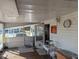 Covered porch with bright natural lighting at 3030 Sun Way, Lakeland, FL 33801