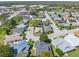 Aerial view of home nestled in a community showcasing well-manicured lawns and a tranquil setting at 3158 Pebble Bend Dr, Lakeland, FL 33810