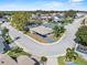 Aerial view of the home, showcasing its location on a corner lot within a quiet, tree-lined neighborhood at 3158 Pebble Bend Dr, Lakeland, FL 33810