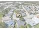 Aerial view of home in neighborhood, showcasing lush landscaping and convenient location at 3158 Pebble Bend Dr, Lakeland, FL 33810