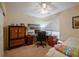 Comfortable bedroom with a ceiling fan, desk area, and wardrobe at 3216 Stonewater Ct # 0, Lakeland, FL 33803