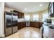 Spacious kitchen with stainless steel appliances and granite countertops at 3510 Kenwood Xing, Lakeland, FL 33812