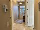 Tiled hallway offering views of the front entrance at 394 Nolane Ln, Polk City, FL 33868