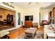 Sunroom featuring tile floors, a ceiling fan, and plenty of windows for natural light at 3976 Cypress W Lndg, Winter Haven, FL 33884