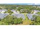 A community of two-story townhomes amidst lush greenery and well-maintained landscaping at 42 Enclave Dr, Winter Haven, FL 33884