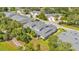 A community of two-story townhomes amidst lush greenery and well-maintained landscaping at 42 Enclave Dr, Winter Haven, FL 33884