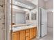 This bathroom features a dual sink vanity, a large mirror, and a shower at 42 Enclave Dr, Winter Haven, FL 33884