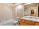 Bright bathroom featuring a tiled shower and vanity at 42 Enclave Dr, Winter Haven, FL 33884