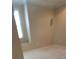 Bedroom with carpet, a modern window, neutral walls, a ceiling fan, and crown molding at 42 Enclave Dr, Winter Haven, FL 33884