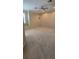 Bedroom with carpet, a large window, neutral walls, a ceiling fan, and crown molding at 42 Enclave Dr, Winter Haven, FL 33884