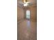 Bedroom with tile flooring, a modern window, neutral walls, and a ceiling fan at 42 Enclave Dr, Winter Haven, FL 33884