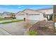Charming townhome with two-car garage and well-maintained landscaping at 42 Enclave Dr, Winter Haven, FL 33884