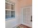 Inviting front entrance features a window and a secured front door at 42 Enclave Dr, Winter Haven, FL 33884