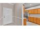 Bright eat-in kitchen with stainless steel appliances and beautiful countertops at 42 Enclave Dr, Winter Haven, FL 33884