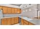 Bright eat-in kitchen featuring stainless steel appliances, undermount sink, and modern lighting at 42 Enclave Dr, Winter Haven, FL 33884