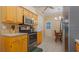 Kitchen with stainless steel appliances, tile floors, and eat-in dining area at 42 Enclave Dr, Winter Haven, FL 33884