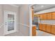 Bright eat-in kitchen with stainless steel appliances and beautiful countertops at 42 Enclave Dr, Winter Haven, FL 33884