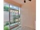 An enclosed lanai with decorative metal door offers outdoor enjoyment at 42 Enclave Dr, Winter Haven, FL 33884
