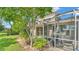A screened-in lanai provides an inviting and relaxing outdoor space at 42 Enclave Dr, Winter Haven, FL 33884