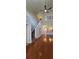 This living room has wood floors, high ceilings, and an open floor plan at 42 Enclave Dr, Winter Haven, FL 33884