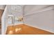 Bright living room with hardwood floors and a view of the kitchen at 42 Enclave Dr, Winter Haven, FL 33884