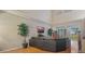 Inviting living room with large windows and a comfortable sectional sofa at 42 Enclave Dr, Winter Haven, FL 33884