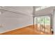 Spacious living room featuring hardwood floors, neutral paint, and lots of natural light at 42 Enclave Dr, Winter Haven, FL 33884