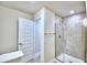 Stylish bathroom with a tiled shower, providing a sleek and functional space for daily routines at 4202 Teeling Ct, Auburndale, FL 33823
