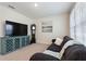 Cozy living room with comfortable seating, soft carpet, and a large TV at 421 Chayne Pl, St Cloud, FL 34771