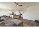 Open-concept space showcasing the kitchen, dining area, and living room with modern furnishings at 421 Chayne Pl, St Cloud, FL 34771