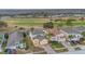 Aerial shot of houses situated near a golf course at 435 Gleneagles Dr, Davenport, FL 33897