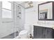 Bathroom featuring walk-in shower with glass enclosure, modern vanity, and sleek fixtures at 435 Gleneagles Dr, Davenport, FL 33897