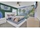 Avatar-themed bedroom with a king-size bed, mural, and serene decor for a tranquil retreat at 435 Gleneagles Dr, Davenport, FL 33897