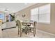Bright dining area with a table, chairs, and a large window at 435 Gleneagles Dr, Davenport, FL 33897