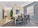 Cozy dining room featuring modern decor, comfortable seating, and seamless access to the adjacent living spaces at 435 Gleneagles Dr, Davenport, FL 33897
