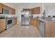 Kitchen featuring stainless steel appliances, granite countertops, and ample storage space at 435 Gleneagles Dr, Davenport, FL 33897