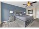 Comfortable main bedroom with a tranquil color scheme, stylish decor and ample natural light at 435 Gleneagles Dr, Davenport, FL 33897