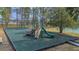 Community playground with slides, climbing structures, and safety surfacing offers a fun recreational space at 435 Gleneagles Dr, Davenport, FL 33897