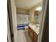 Bathroom with a shower, toilet, vanity, and tile floors at 5407 Quarry Rock Rd, Lakeland, FL 33809