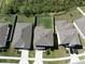 Aerial view of the home reveals a large, grassy backyard and neighboring properties at 5531 Keaton Springs Dr, Lakeland, FL 33811