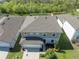 Aerial view of a well-maintained home with a landscaped yard at 5531 Keaton Springs Dr, Lakeland, FL 33811