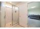 Modern bathroom featuring a glass-enclosed shower with white subway tile and neutral tones at 5531 Keaton Springs Dr, Lakeland, FL 33811